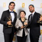 Producer: Igor Alves, Conductor: Xian Zhang, Director: Yuri Alves holding Emmy