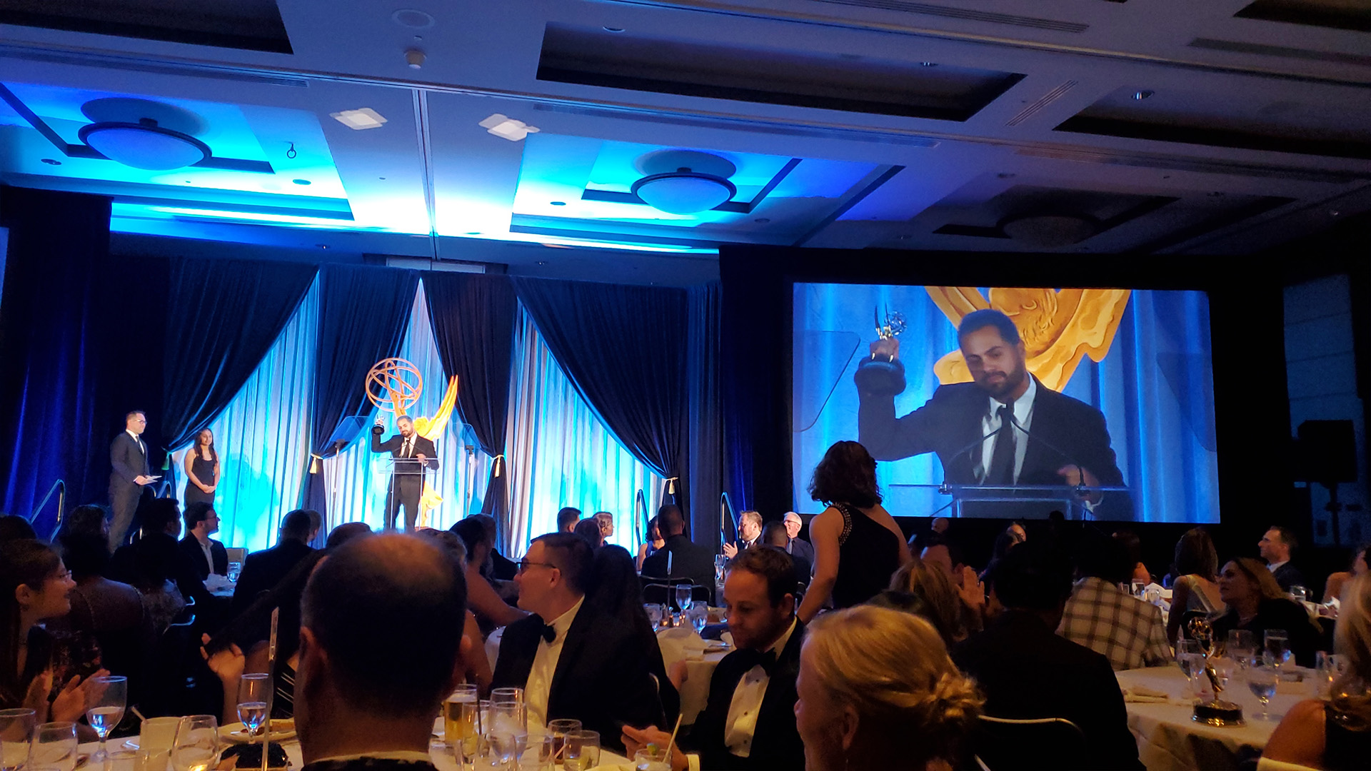 Director, Yuri Alves accepting the Emmy award for emerge and grind