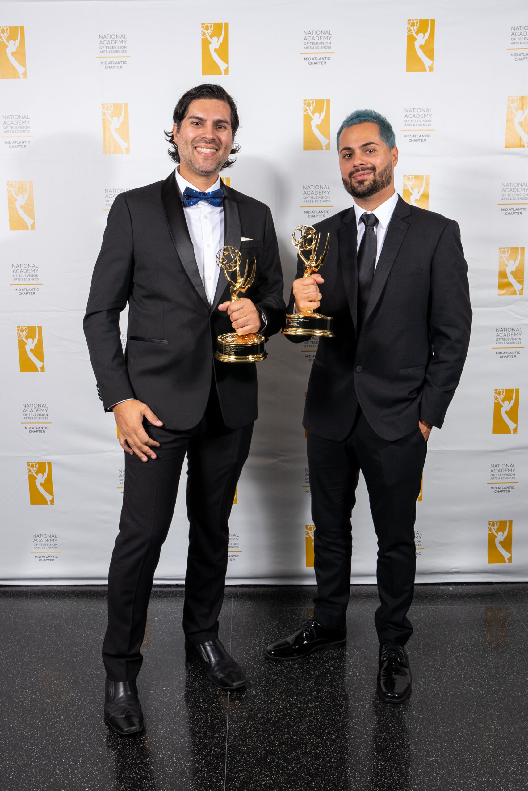 Igor Alves and Yuri Alves with their Emmy Awards at the awards gala.