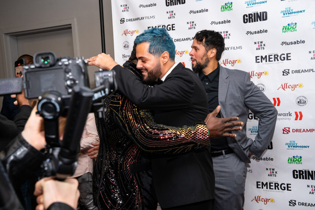 Grind star Robert Willmote and director Yuri Alves embracing