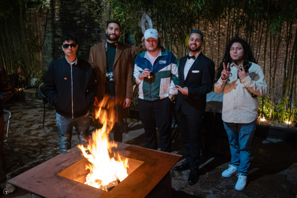 After-Party: Yuri Alves and guests gathered around fire-pit