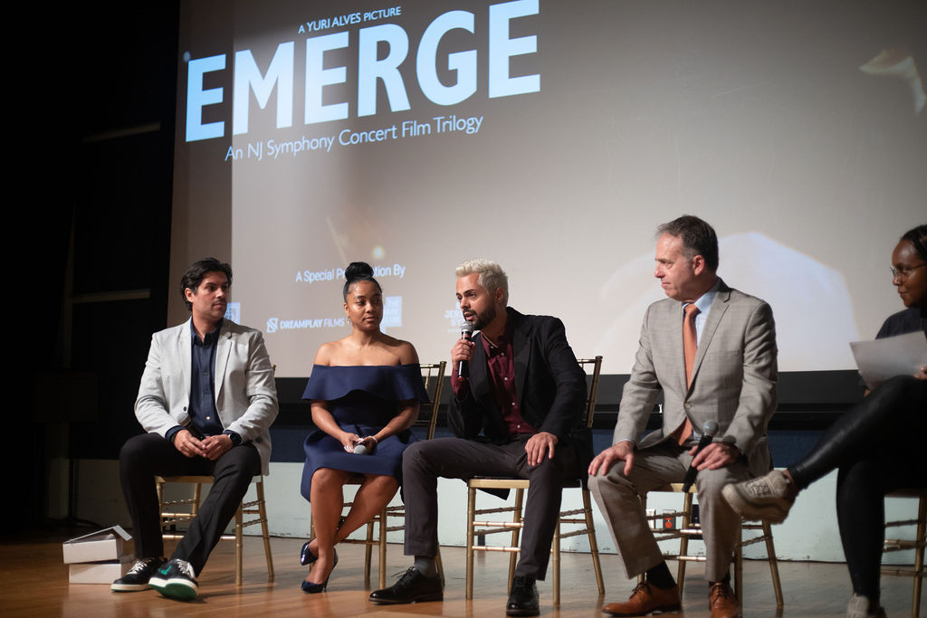 Director Yuri Alves answering audience member question at EMERGE screening