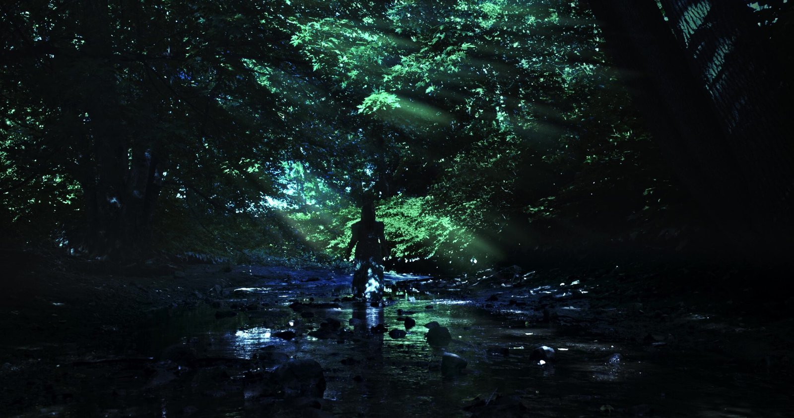 Kween walking through river