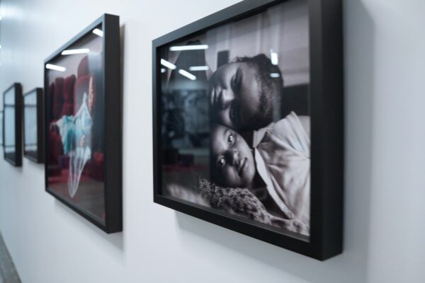 Wall at Express Newark with photos of black girls