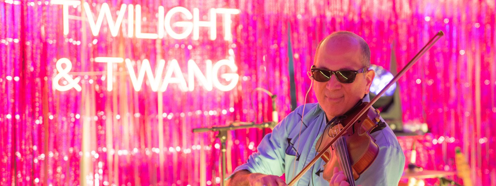 Audible. Holiday Party violin playing