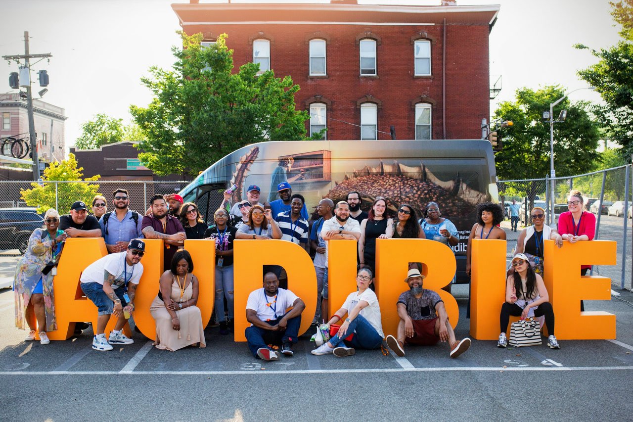 Audible group photo by letters