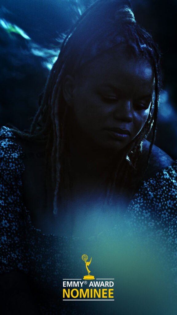 Kween Moore near river in moonlight